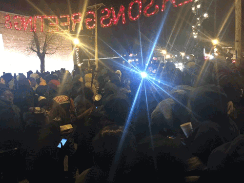 Protesters listening in Ferguson to McCullough's statement