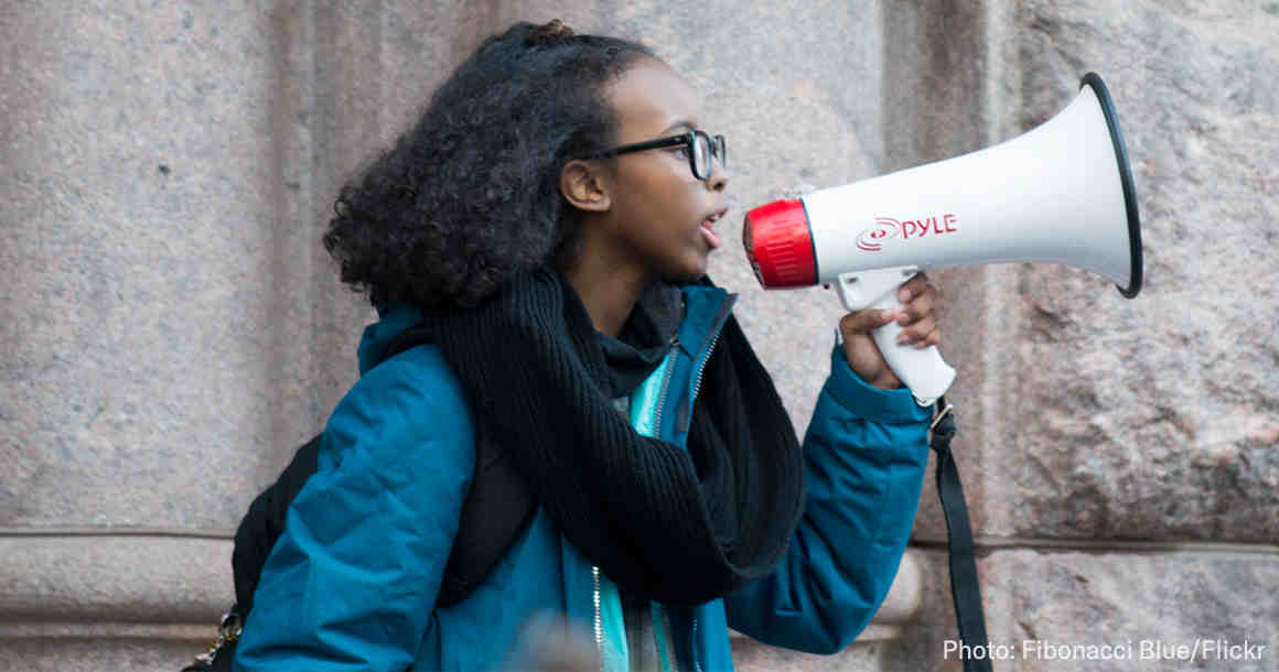 Student Protesting with a megaphone
