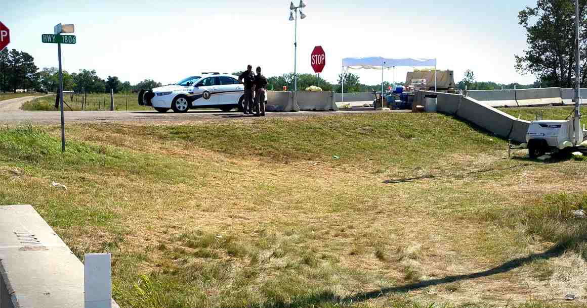 Police enforce a road barricade on a public highway that leads to the protest area and the Standing Rock Sioux Tribe’s reservation.