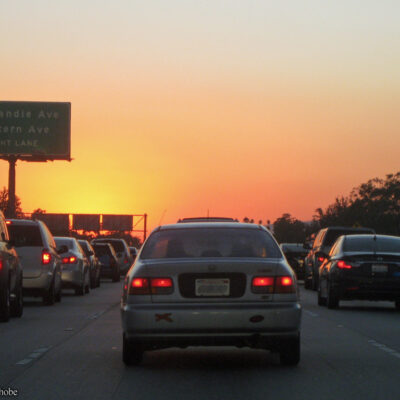 Photo of cars on LA freeway at dusk