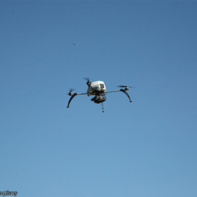 Drone against blue sky