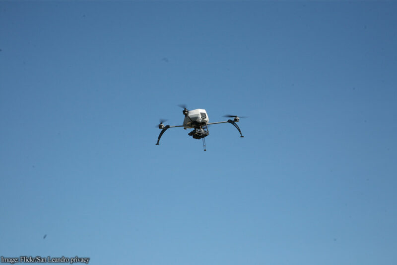 Drone against blue sky