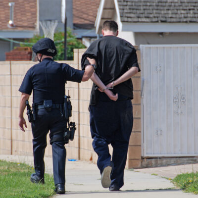 Photo of LAPD officer making an arrest