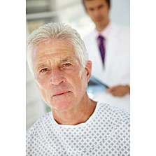 A man in a hospital gown.