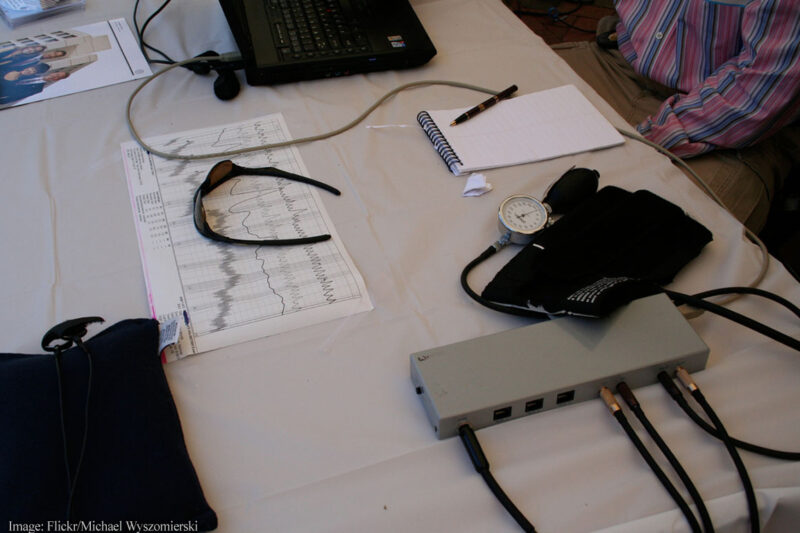 Polygraph setup on table at FBI recruiting event