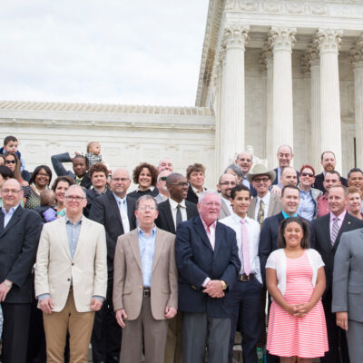 Plaintiffs and families in front of the Supreme Court