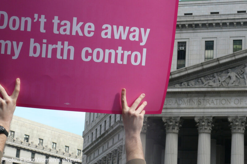 Protester holding up "Don't take away my birth control" sign