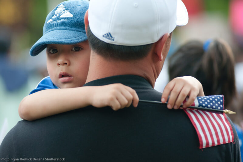 Child on Dad's Shoulders