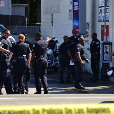 Police gather on the street