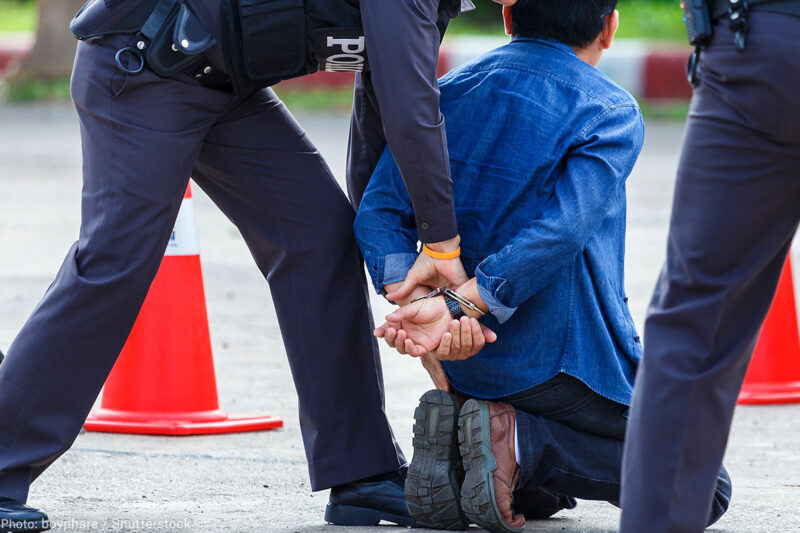 Police Arrest Man With Blue Shirt