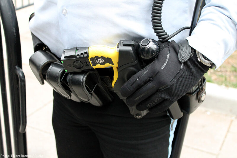 Police officer with taser