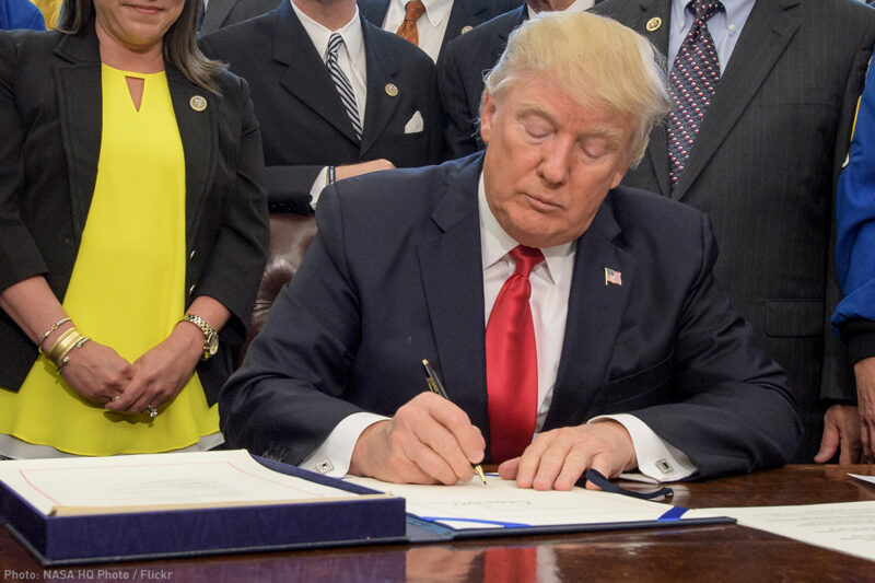 Trump Signing Paper