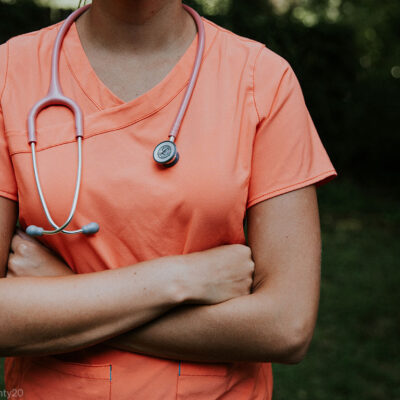 Doctor with arms folded looking defiant