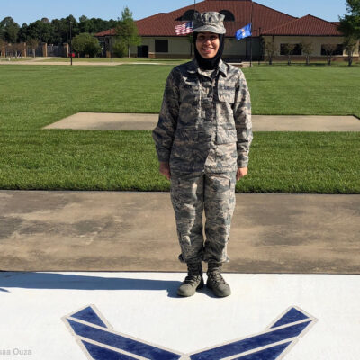 Plaintiff Maysaa Ouza standing in uniform