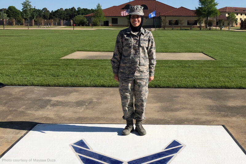 Plaintiff Maysaa Ouza standing in uniform
