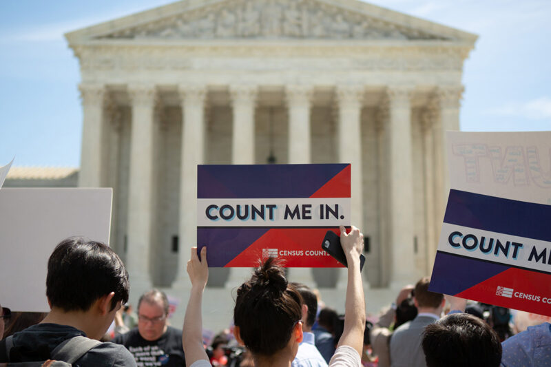 Demonstrators marching against adding a question regarding citizenship to the Census