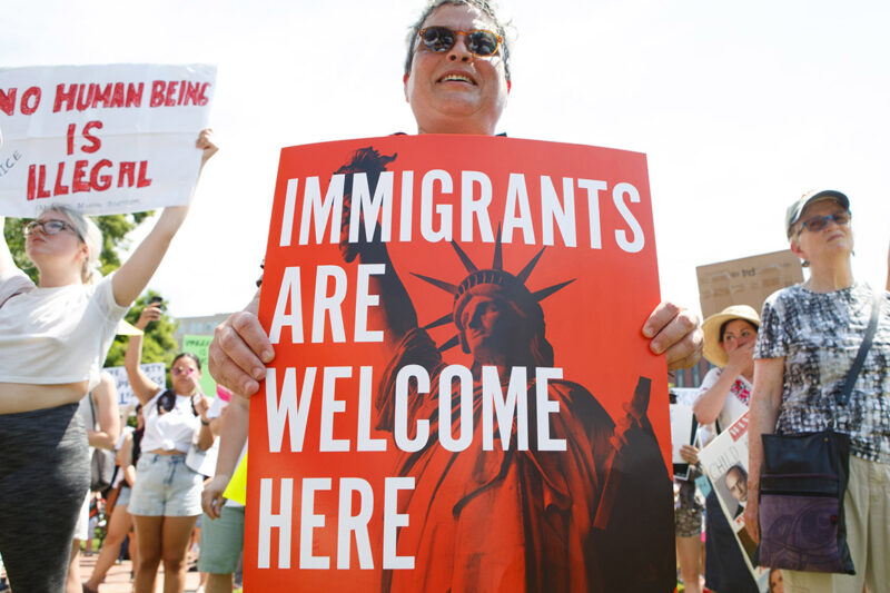 Demonstrators marching in favor of immigrant's rights