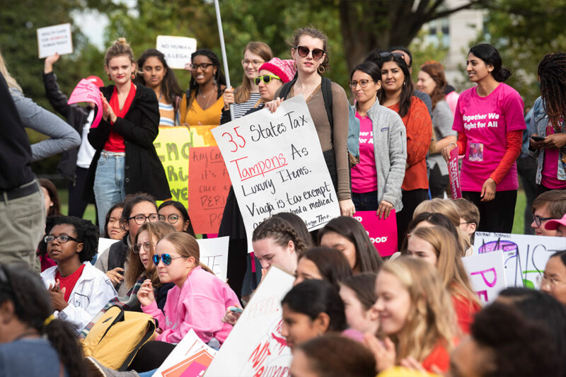 Menstrual activists demonstrate at the Capitol during a National Period Day rally.