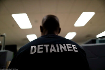 A detainee sits at the Otay Mesa Detention Center in San Diego.