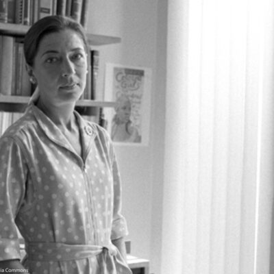 Ruth Bader Ginsberg standing in an office, 1977