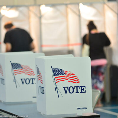 Voting booths are kept socially distant at a New Hampshire polling site.