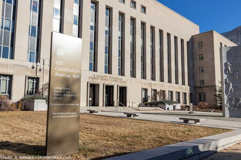 E. Barrett Prettyman United States Courthouse information sign at the entrance to the Federal courthouse in Washington, D.C.