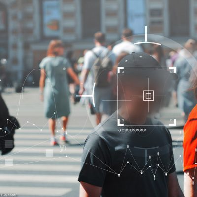 Face recognition and personal identification technologies in street surveillance cameras, scanned over crowd of passers-by