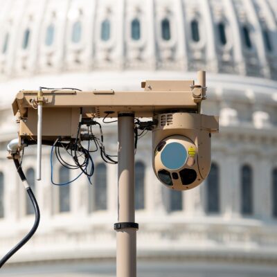 A close-up of a video surveillance unit set up in front of the U.S. Capitol building.