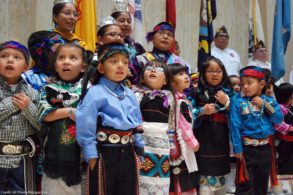 Children from the Zuni Pueblo lead the U.S. pledge of allegiance in the Zuni language in the New Mexico state Capitol in Santa Fe, N.M.