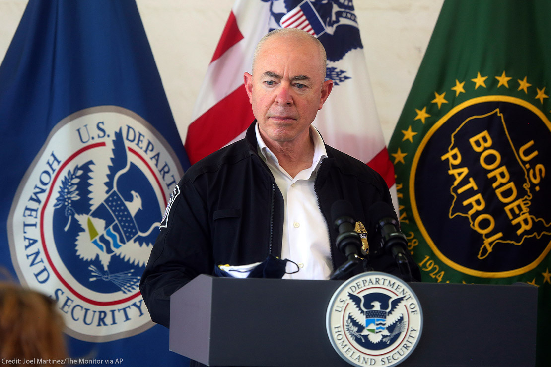 Homeland Security Secretary Alejandro Mayorkas listens to questions from reporters.