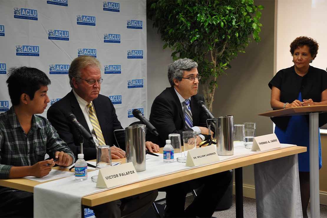 Seated from left to right is Victor Palafox, Dr. William Lawrence, Thomas A. Saenz and standing is Murphy.