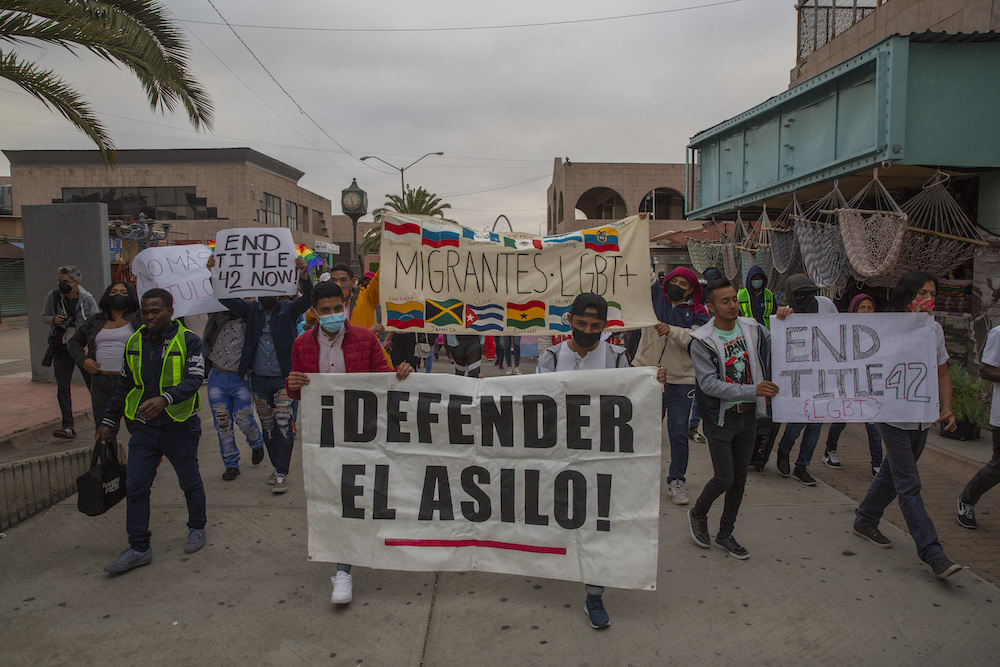 A demonstration featuring many pro-immigration/ anti-discrimination signage.