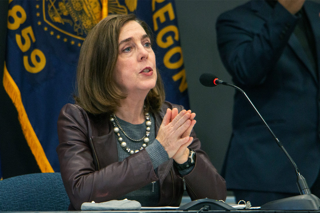 Oregon Gov. Kate Brown defending granting clemency at a press conference in Portland, Oregon.