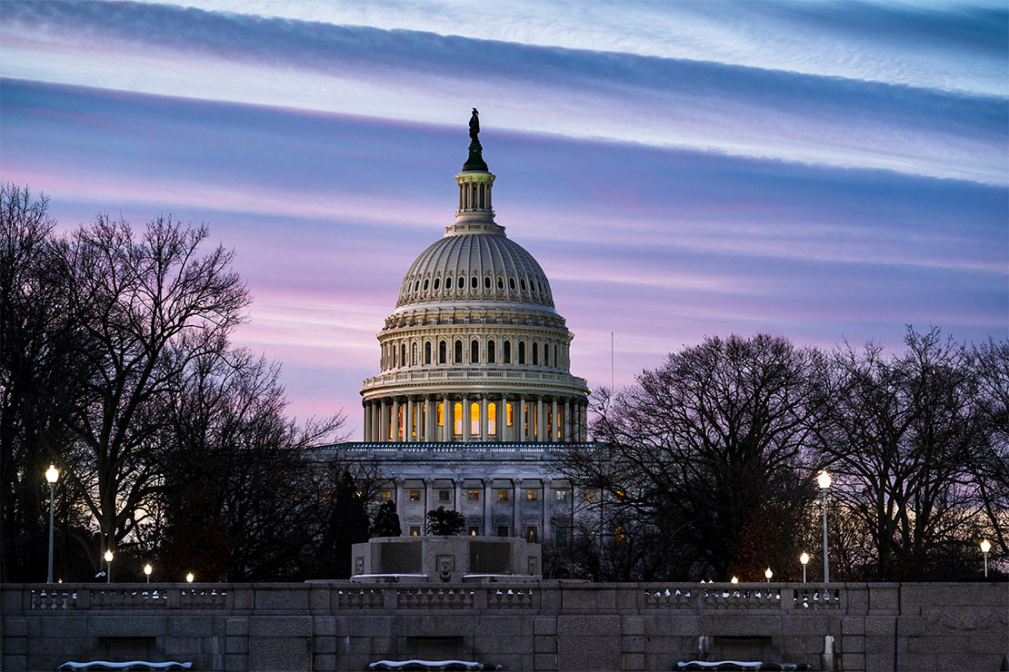 The U.S. Capitol building at dawn.