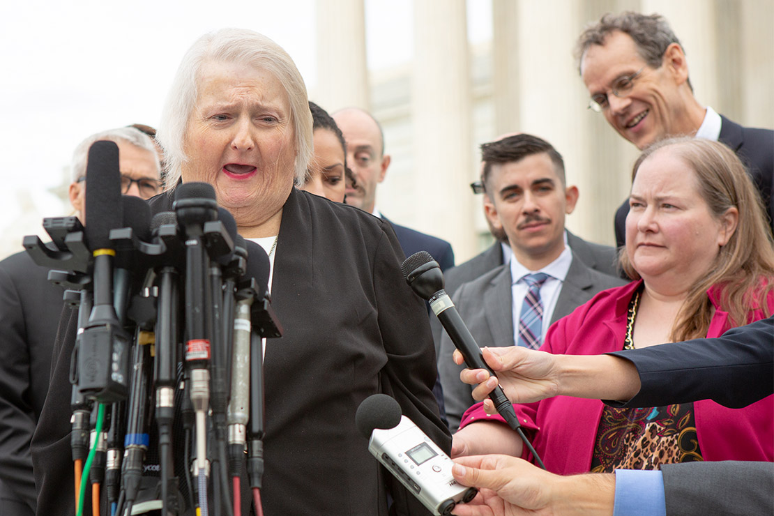 Aimee Stephens in front of the Supreme Court