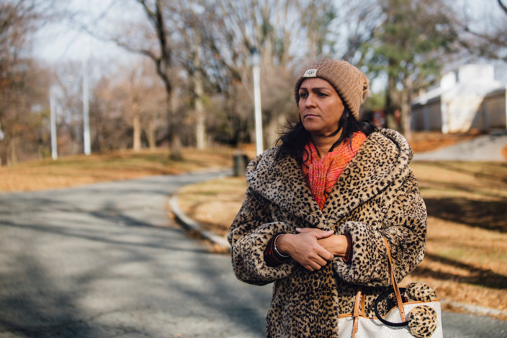 Linda Dominguez looks ahead, in the middle of a park.