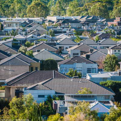 A view of a group of house roofs.