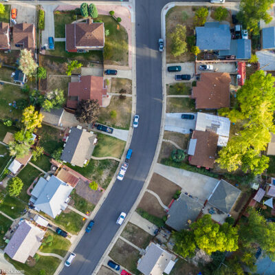 An aerial view of a neighborhood filled with houses.