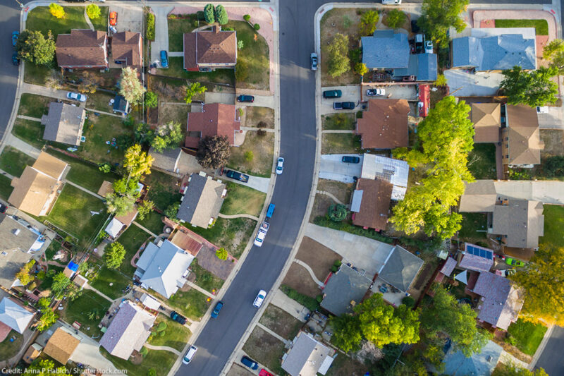 An aerial view of a neighborhood filled with houses.