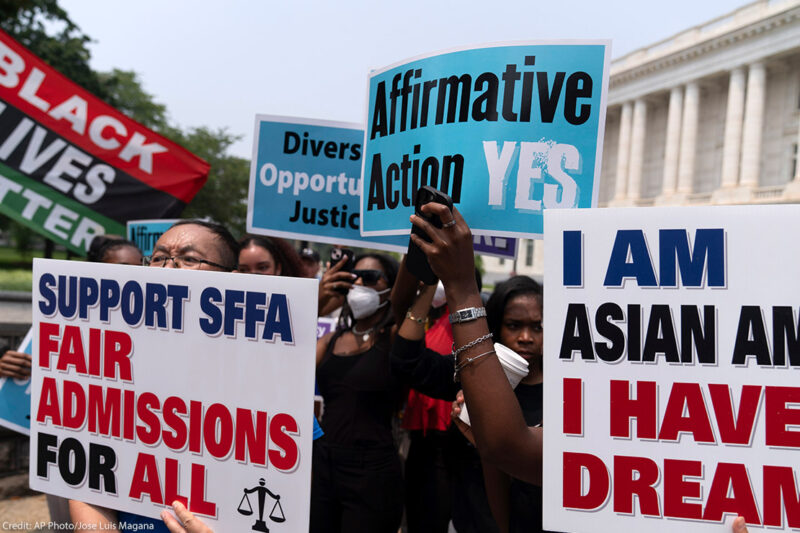 Demonstrators protest outside of the Supreme Court in Washington.