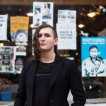 headshot of musician, writer, and organizer Evan Greer. She has a neutral expression
