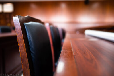 A close up image of a series of jury seats.