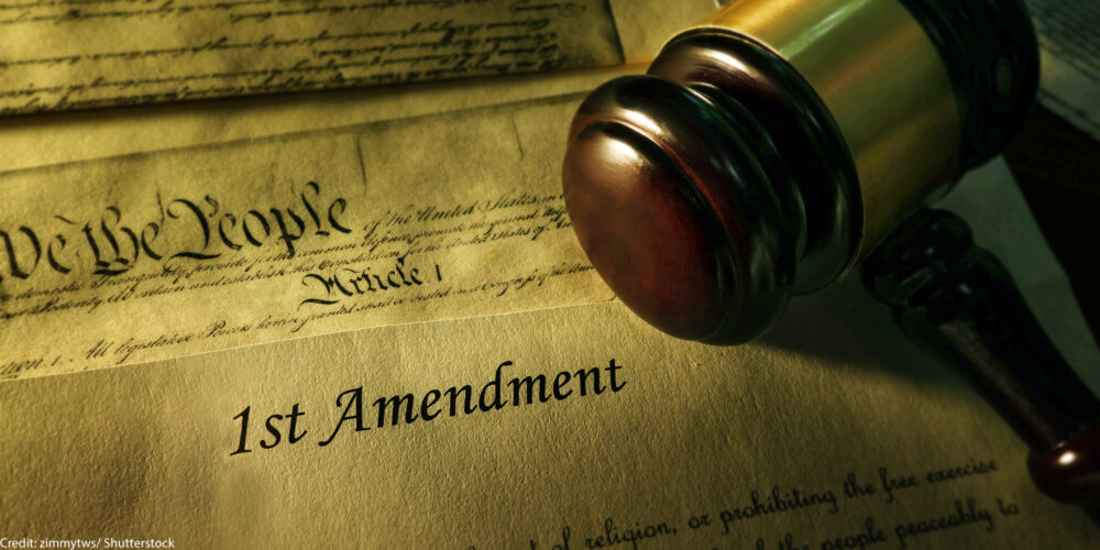A gavel over text of the First Amendment.