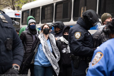 Masked Pro-Palestine students being arrested by NYPD.